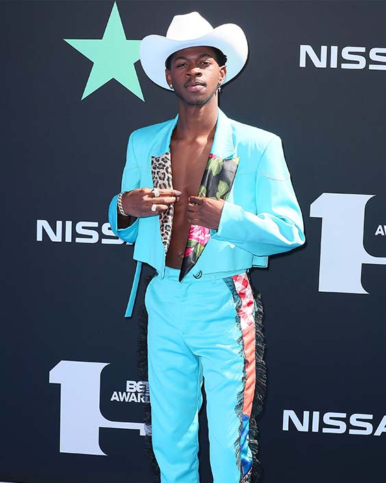 Lil Nas X in a baby blue cowboy suit