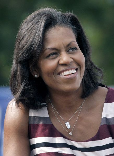 Michelle Obama Dog Tag Necklace - Michelle Obama made a subtle statement with her necklaces during a campaign rally in Detroit. One was a dog tag pendant etched with the word 'Hope' and the other…
    