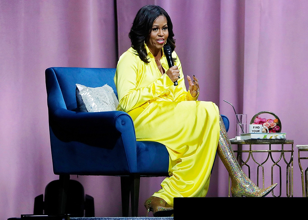 Michelle Obama in yellow and sparkle boots