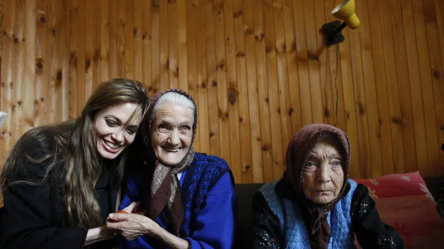 angelina jolie in sarajevo with a grandma