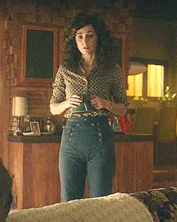 Apple TV’s show Physical starring Rose Byrne as Sheila Rubin wearing a denim bell pants and a blouse