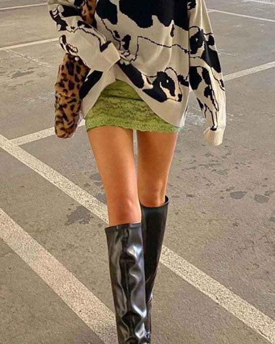 Cow printed jumper with neon lace and faux leather boots