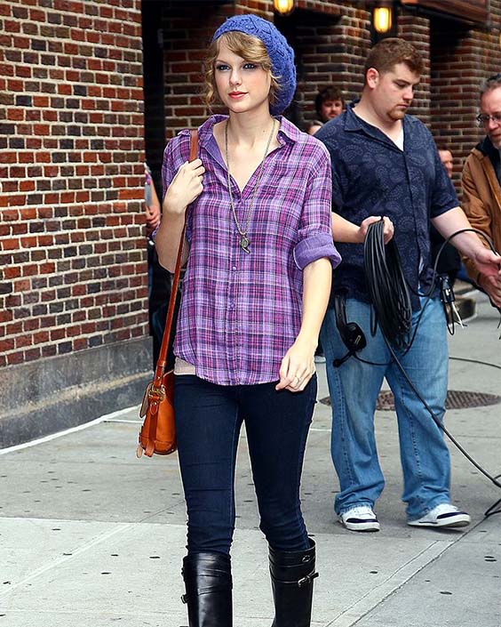Taylor Swift in a purple flannel shirt